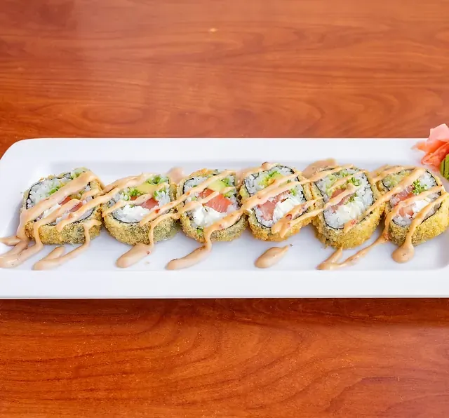 Crispy Bagel Roll platter, flash-fried in panko and finished with bamboo sauce and sesame seeds