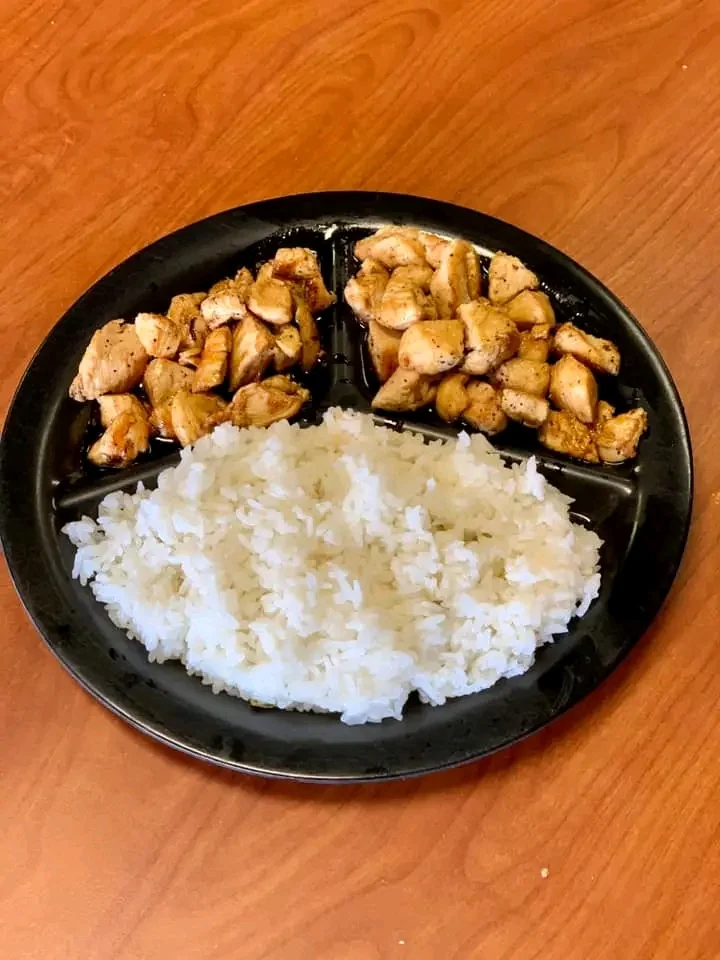 Plate of teriyaki chicken bites served with steamed white rice